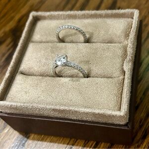 Engagement ring and wedding band. receipt on photos. Very nice worn one week.